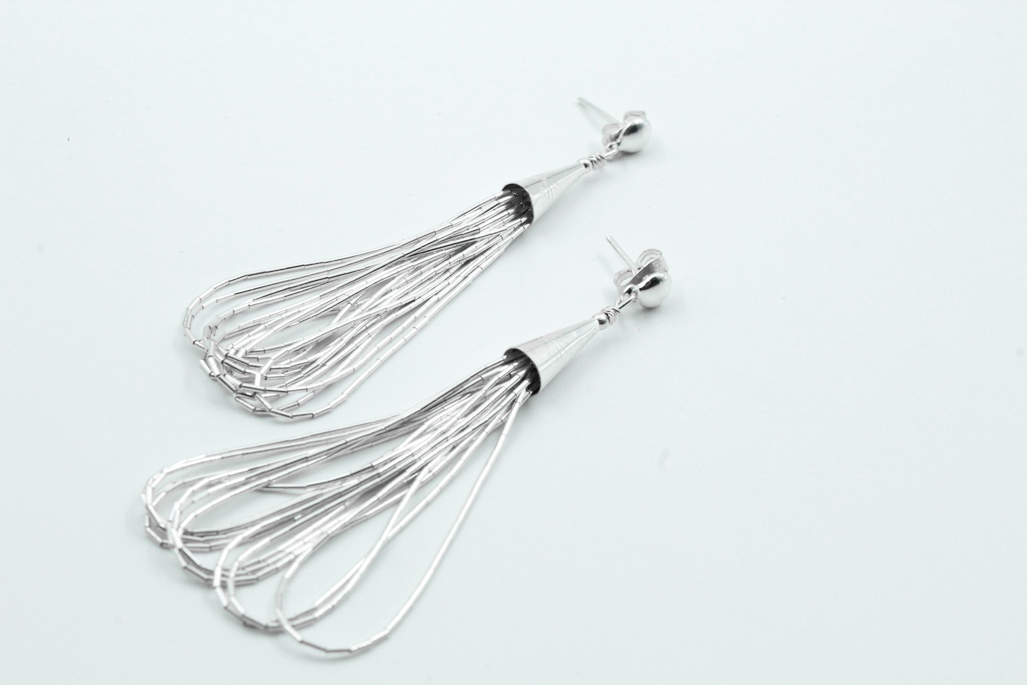 ARETES GOTA LÍQUIDA